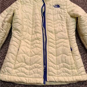 The North Face Light Yellow Quilted Jacket with Blue Accents